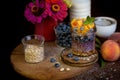 Homemade granola, muesli with blueberry and yogurt in glasses on rustic wooden background. Healthy breakfast. Royalty Free Stock Photo