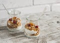 Homemade granola and natural yoghurt on a light wooden surface. Healthy food, healthy Breakfast Royalty Free Stock Photo