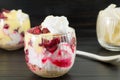 Homemade granola parfait with cherries and cream