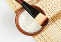 Homemade greek yogurt facial mask in the small brown bowl. Diy natural beauty treatment recipe.