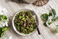 Homemade green nettle pasta with fried spring morel mushrooms Royalty Free Stock Photo