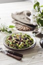 Homemade green nettle pasta with fried spring morel mushrooms Royalty Free Stock Photo