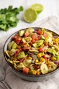 Homemade Grilled Corn Summer Pasta Salad in a Bowl on a white wooden background, low angle view. Close-up Royalty Free Stock Photo