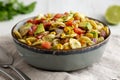 Homemade Grilled Corn Summer Pasta Salad in a Bowl on a white wooden background, low angle view. Close-up Royalty Free Stock Photo