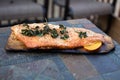 Homemade Grilled Salmon whole filet on a Cedar Plank