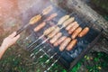 Homemade grilled sausages outdoors. Tasty food for barbecue party Royalty Free Stock Photo