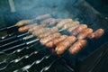 Homemade grilled sausages outdoors. Tasty food for barbecue party Royalty Free Stock Photo