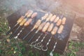 Homemade grilled sausages outdoors. Tasty food for barbecue party Royalty Free Stock Photo