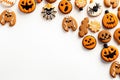 Homemade Halloween cookies on a white background, top view. With Generative AI technology