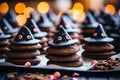 Homemade Halloween Goodies - gingerbread Cookies and Magical Chocolate Witch Hat Desserts - Generative AI