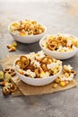 Homemade Halloween trail mix with popcorn, pretzels and nuts Royalty Free Stock Photo