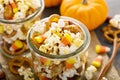 Homemade Halloween trail mix with popcorn, pretzels and nuts Royalty Free Stock Photo