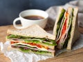 Homemade ham cheese sandwich and coffee cup for breakfast. Royalty Free Stock Photo