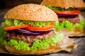 Homemade Hamburger With Fresh Green Lettuce, Tomato And Red Onion