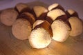 Homemade handmade sweet candy balls in cocoa shavings. Light beam. Healthy eating lifestyle concept