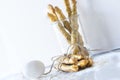 Homemade hard breads with an egg on white background, close up