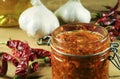 Homemade harissa sauce in a small jar Royalty Free Stock Photo