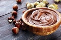 Homemade hazelnut spread in wooden bowl. Hazelnut Nougat cream Royalty Free Stock Photo