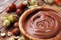 Homemade hazelnut spread in wooden bowl. Hazelnut Nougat cream Royalty Free Stock Photo