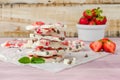 Homemade healthy frozen strawberry yogurt bark on rustic wooden background Royalty Free Stock Photo