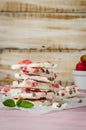Homemade healthy frozen strawberry yogurt bark on rustic wooden Royalty Free Stock Photo