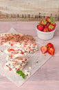 Homemade healthy frozen strawberry yogurt bark. Top view Royalty Free Stock Photo