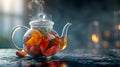 Homemade healthy hot fruit tea with fresh ripe orange, apple, mint leaves and twigs of thyme in glass teapot or kettle Royalty Free Stock Photo