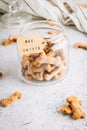 Homemade and healthy pumpkin dog bone cookies. Some on cooling rack with some on a plate. Top view Royalty Free Stock Photo