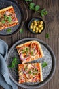 Homemade healthy Shiitake mushroom pizza topped with slices with green olives, cheese, red onion and oregano Royalty Free Stock Photo