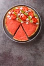 Homemade healthy strawberry and rhubarb tart decorated with mint and whipped cream close-up on a plate on the table. Vertical top Royalty Free Stock Photo