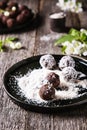 Homemade healthy vegan chocolate balls, truffles, candies sprinkled grated coconut Royalty Free Stock Photo