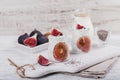 Homemade healthy yoghurt in glass jars with figs and chia seeds Royalty Free Stock Photo