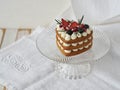 Homemade heart shaped cake with strawberries on a white napkin Royalty Free Stock Photo