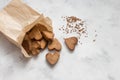 Homemade heart-shaped cookies in a craft bag, a Valentine`s Day gift with love, gluten-free buckwheat flour pastries Royalty Free Stock Photo