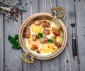 Homemade Hearty Breakfast Skillet with Eggs and Bacon Royalty Free Stock Photo