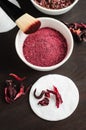 Homemade hibiscus powder for preparing face and body mask or exfoliating scrub bath salts, foot soak.