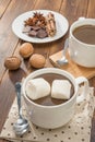 Homemade hot chocolate and marshmallow, spice with walnut Royalty Free Stock Photo