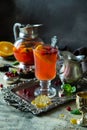 Homemade hot cranberry tea in glass cup on vintage silver tray Royalty Free Stock Photo