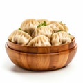 Homemade and hot manti, dumplings with meet filling in wooden bowl