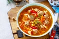 Homemade Hot Soup with pasta, turkey meatballs and Peas Chickpeas. Royalty Free Stock Photo