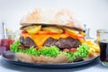 Homemade huge giant cheeseburger for burger party, horizontal Royalty Free Stock Photo