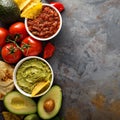 Homemade hummus, salsa and guacamole with corn chips Royalty Free Stock Photo