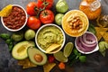 Homemade hummus, salsa and guacamole with corn chips Royalty Free Stock Photo