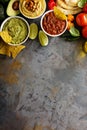 Homemade hummus, salsa and guacamole with corn chips Royalty Free Stock Photo