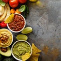 Homemade hummus, salsa and guacamole with corn chips Royalty Free Stock Photo