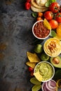 Homemade hummus, salsa and guacamole with corn chips Royalty Free Stock Photo