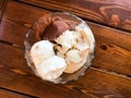 Homemade Ice Cream in Glass Bowl on Wooden surface. Royalty Free Stock Photo