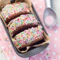 Homemade ice cream sandwich with chocolate chip cookie, watermelon ice cream and covered with colorful sprinkles, top view, square Royalty Free Stock Photo