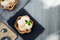 homemade Ice cream scoops with vanilla ice cream in a bowl with mint. Top view