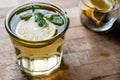 Homemade ice tea with lemon and mint leaves. Royalty Free Stock Photo